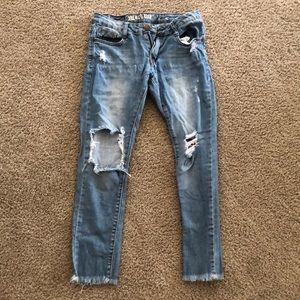 Distressed Capri length skinny jeans